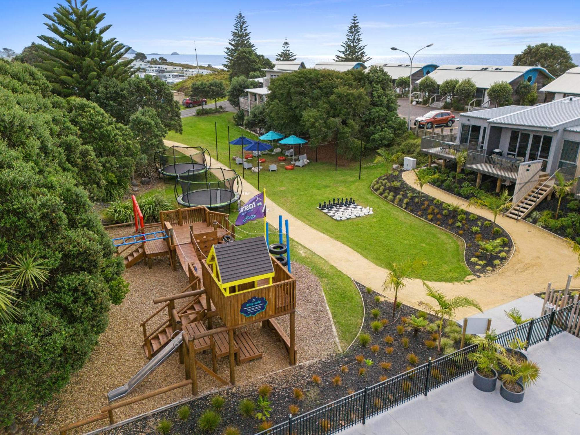 Tasman Holiday Parks - Papamoa Beach Exterior photo Aerial view of the playground at the centre