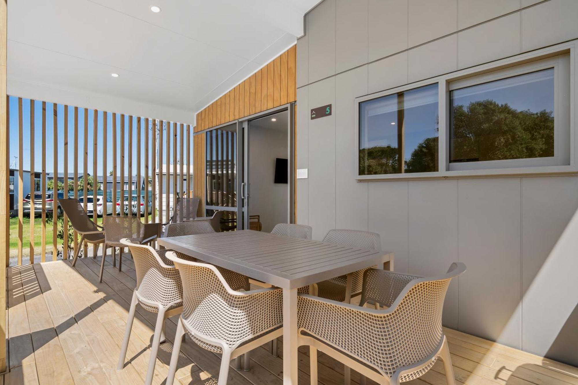 Tasman Holiday Parks - Papamoa Beach Exterior photo 3D rendering of a balcony