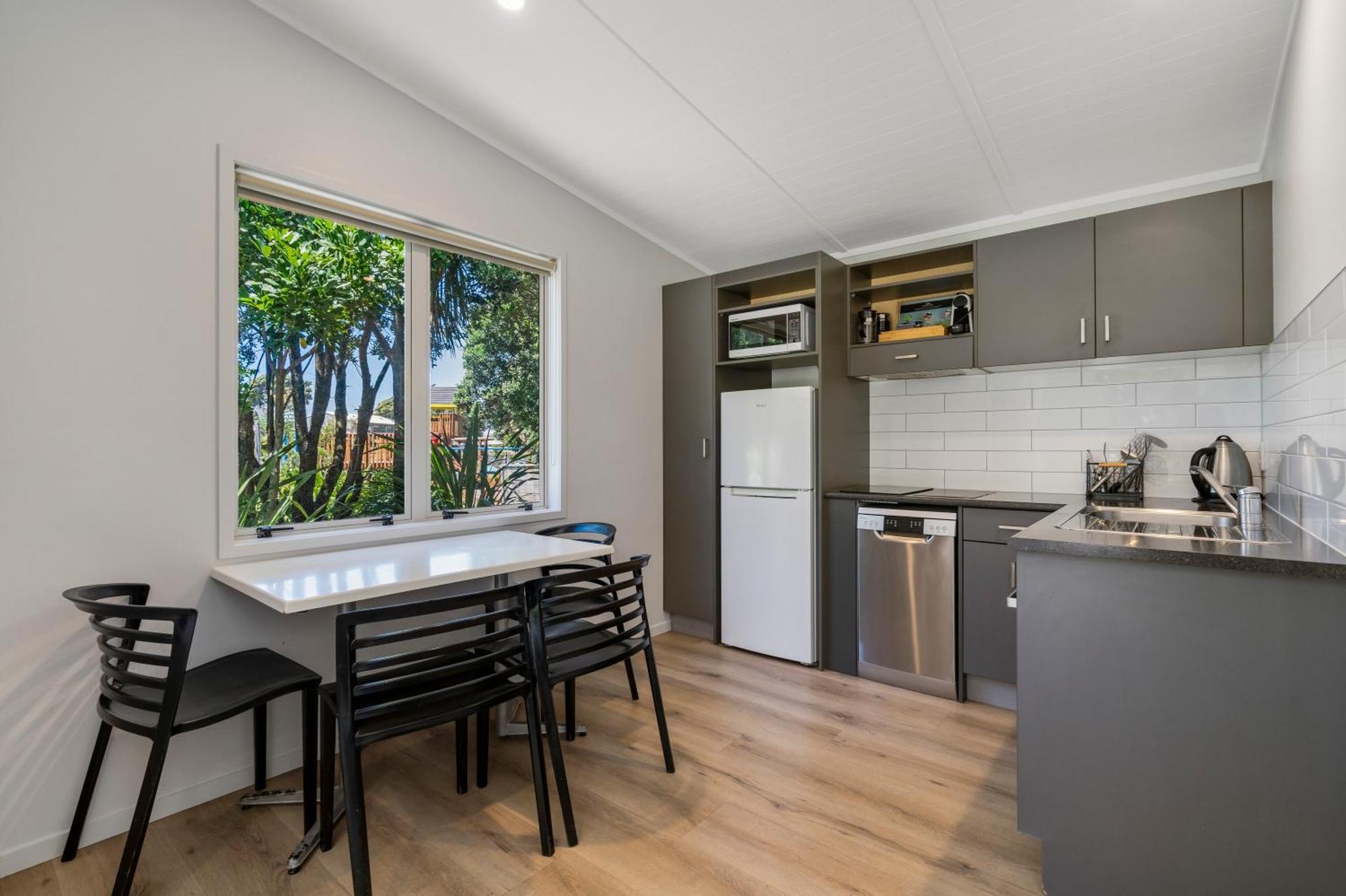 Tasman Holiday Parks - Papamoa Beach Exterior photo A staged kitchen